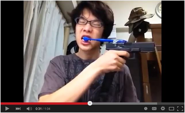 Brushes Teeth with Airsoft Gun